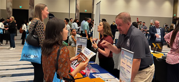 Prospective medical students speak with osteopathic medical college recruiters.